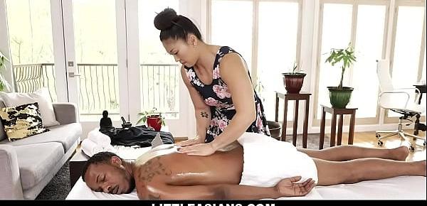  Seductive Asian masseuse Nyomi Star started a sizzling fuck massage with black stud Charlie Mac.